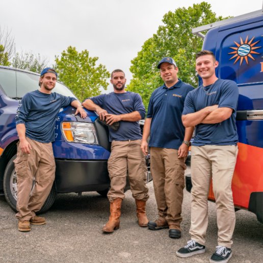 Garage door technician performing service work